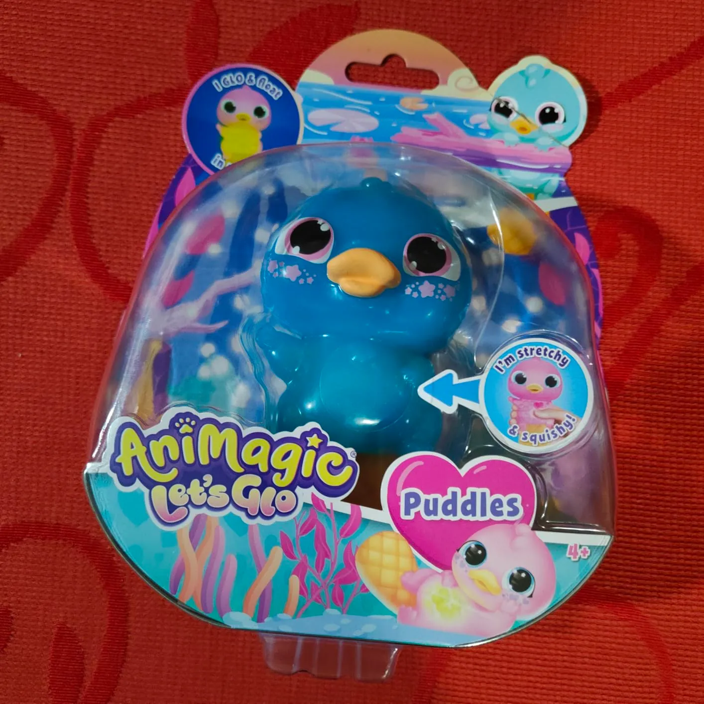 Animagic Let's Glo Puddles Rosa peluche sensoriale luminoso
