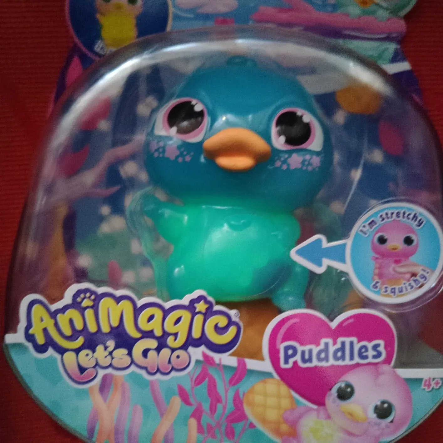 Animagic Let's Glo Puddles Rosa peluche sensoriale luminoso