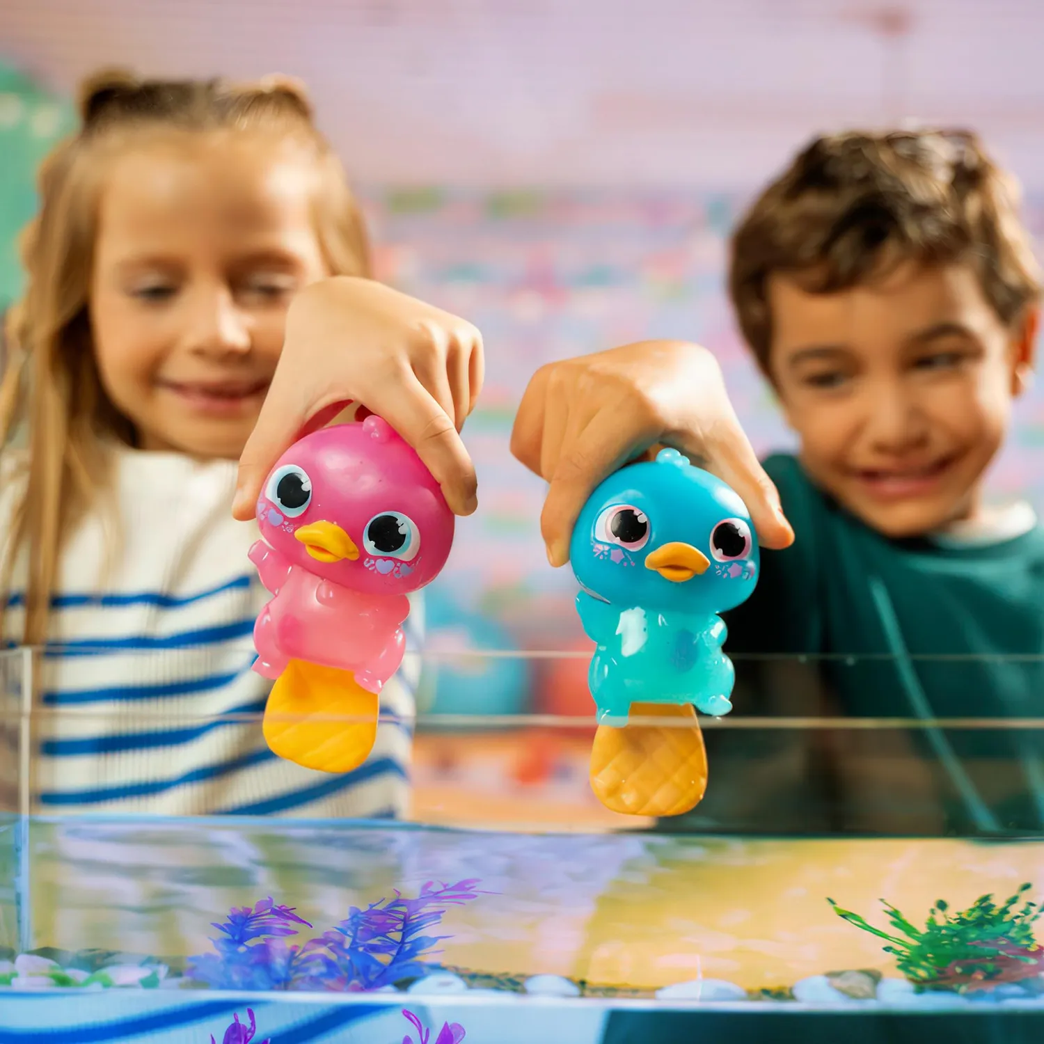 Animagic Let's Glo Puddles Rosa peluche sensoriale luminoso